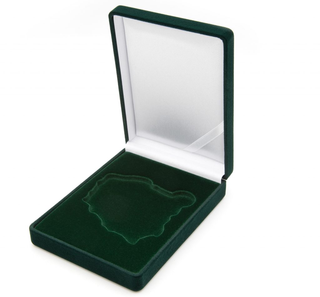 Medal box with a custom pad